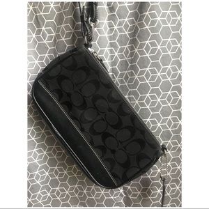 Small Coach purse / oversized wristlet.